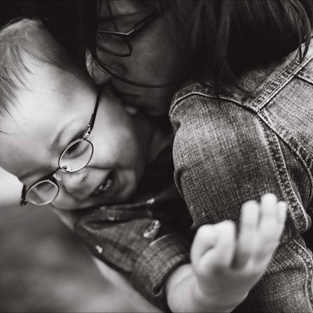 I love you both. My wife and cute son hugging.